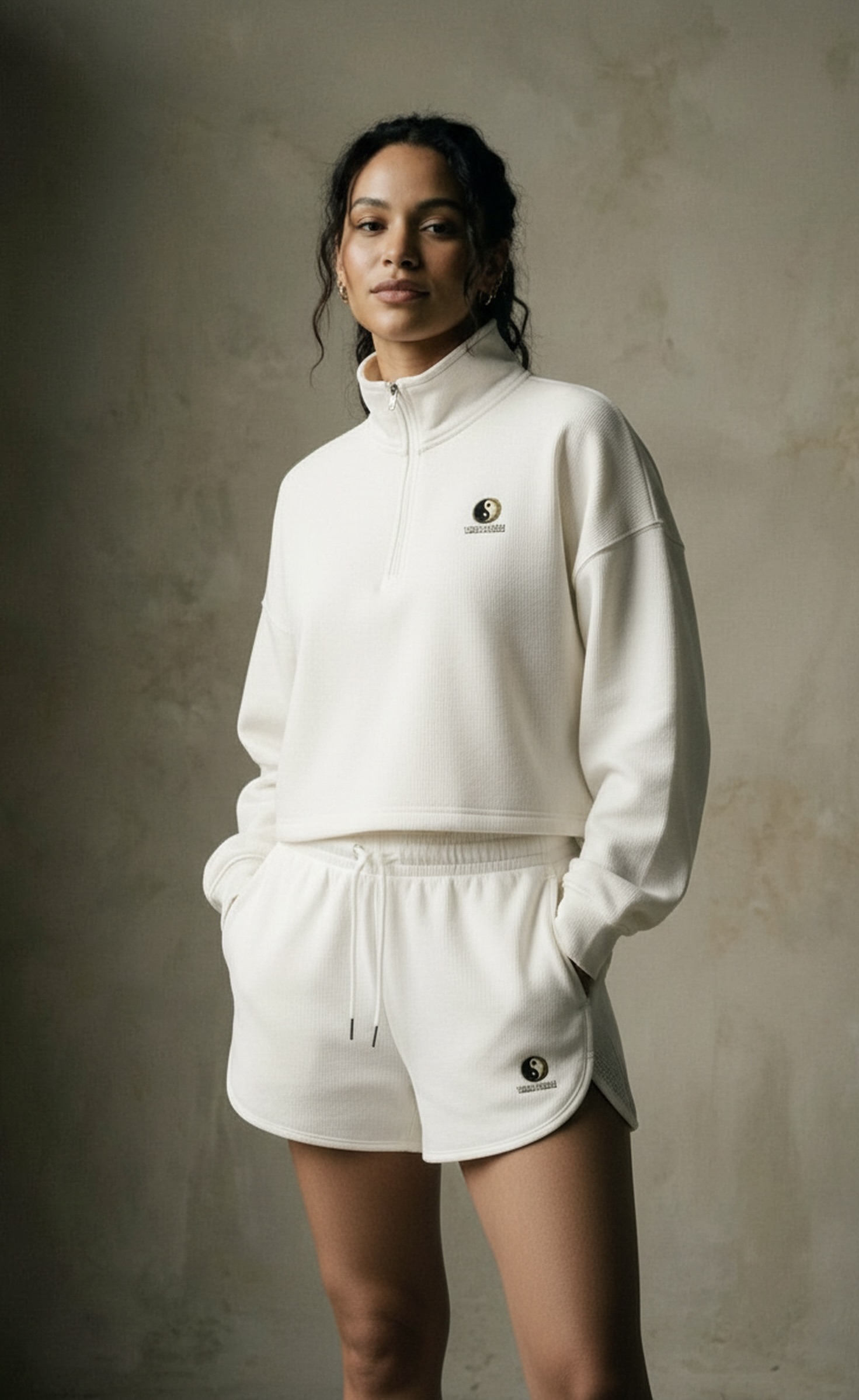Worn Peace — studio portrait in a stone streetwear set